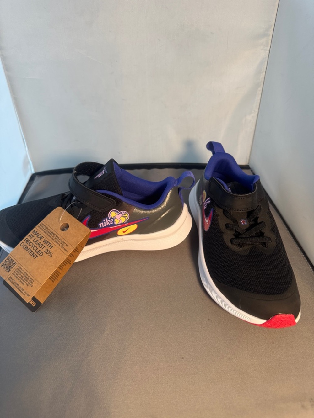 Nike Kids Black Sneakers with Purple Lining and Pink Accents 3Y
